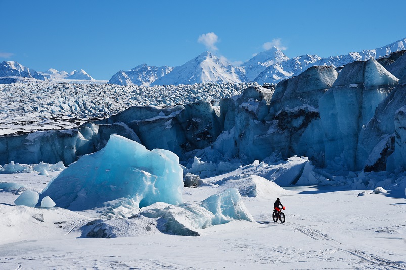 Devin Kelly fatbiking at Kink Glacier in the spring.