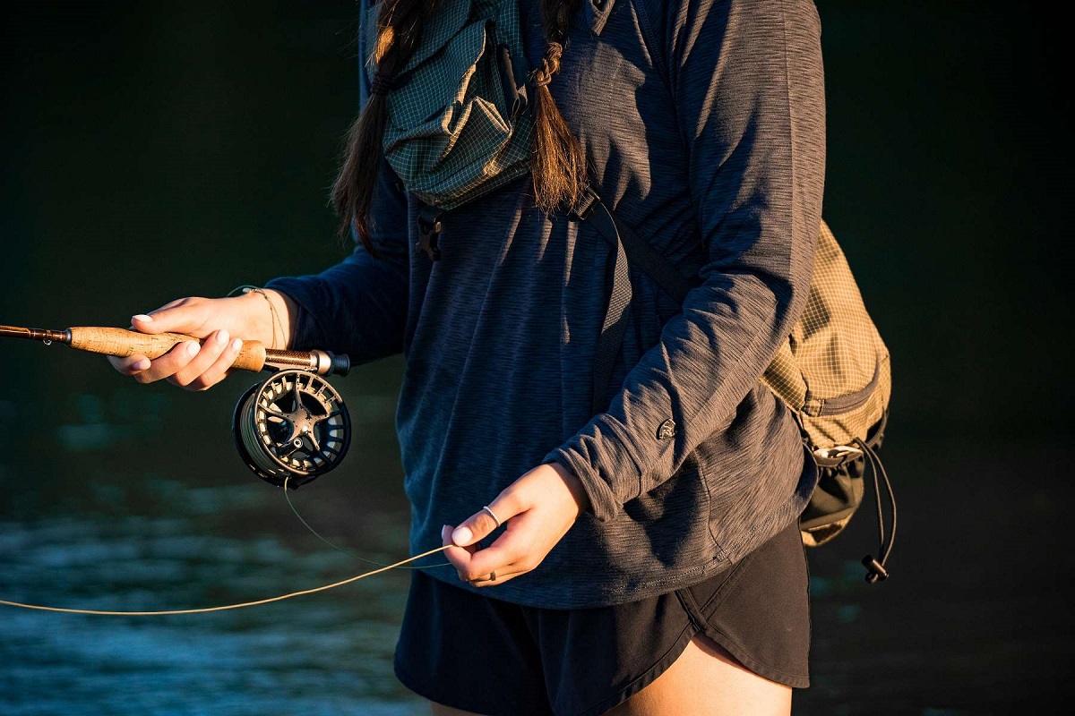 woman fly fishing