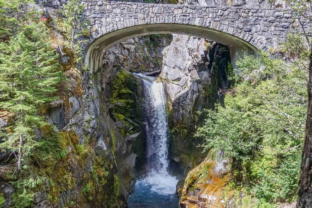 gray concrete bridge over river